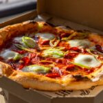 Pizza mit Ei öffnen: Kochtipps