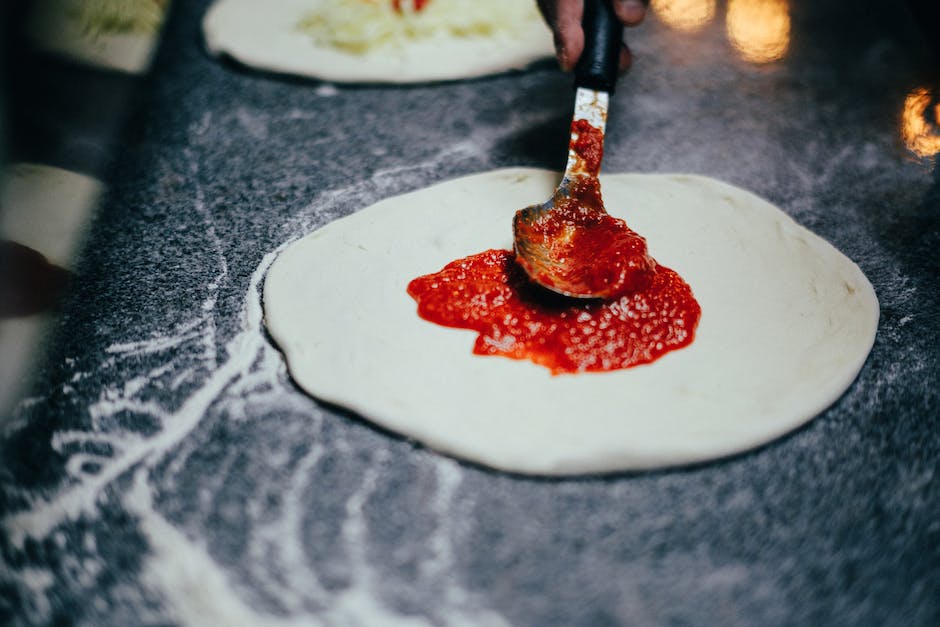 Wie viel Tomatensauce für eine Pizza?