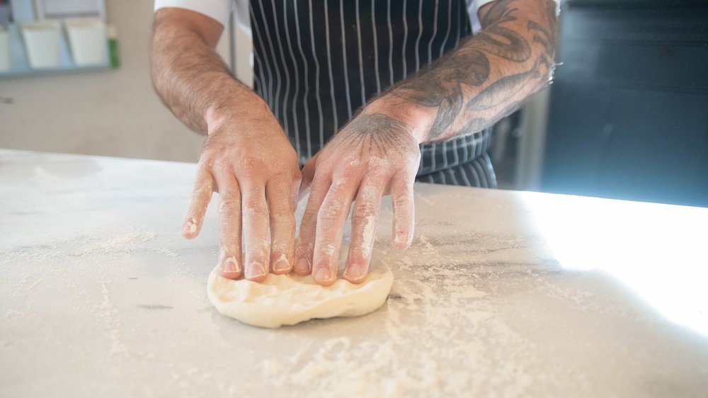 wie lange muss eine pizza in den ofen